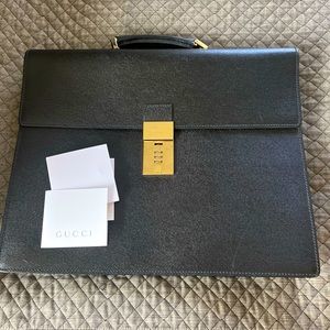 GUCCI flap over briefcase with combination lock